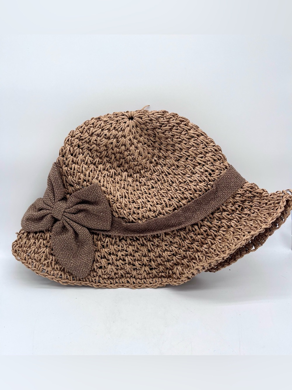 Women’s crocheted straw cloche hat with a bowknot